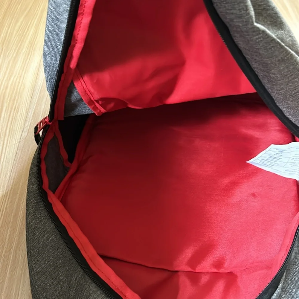 Puma backpack black red gray laptop compartment pockets, front zip pocket, logo